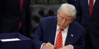 Trump Signs Spending Bill, Ending Brief Government Shutdown