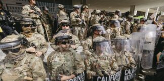 Court Checks Guard Deployment